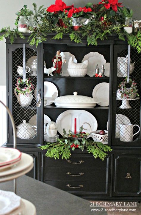 Hutch painted black, center doors removed, displays white ironstone and Christmas decor. Hutch Decorating Ideas, Black Hutch, Painted Hutch, Black China, Hutch Decor, Milk Glass Collection, Christmas Dining Room, Christmas Tours, Dried Oranges