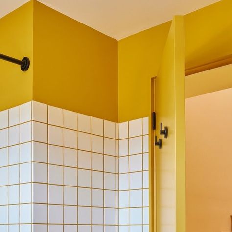 Architecture + Interior Design by @andandand.studio | photos by @yoshihiromakino White Tiles Yellow Grout, Contrast Grout Bathroom, Andandand Studio, Bathroom 80s Style, Yellow Ceiling Bathroom, Orange Grout Bathroom, Playful Bathroom Design, Colourful Small Bathroom, Bathroom With Wooden Floor