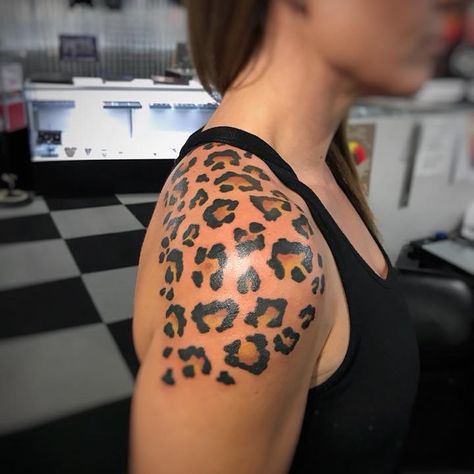 Cheetah Print Thigh Tattoo, Lepord Print Tattoo Ideas, Leopard Print Shoulder Tattoo, Leopard Print Arm Tattoo, Cheetah Print Tattoo For Women, Leopard Shoulder Tattoo, Cheetah Print Tattoo On Shoulder, Leopard Print Tattoo On Shoulder, Animal Print Tattoo For Women