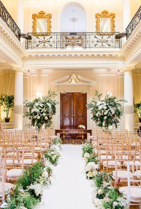 For 2019 weddings, greenery continues to be a classic go-to shade, with flowers and foliage becoming more organic and lush. “Trees and use of foliage throughout floral designs will take centre stage," describes wedding planner Bruce Russell. "Florals will be natural, whimsical and romantic.” Wedding With Balloons, Indoor Wedding Ceremony, Hedsor House, Number Table, Country House Wedding Venues, Country House Wedding, Aisle Flowers, Luxury Wedding Venues, Pretty Tables