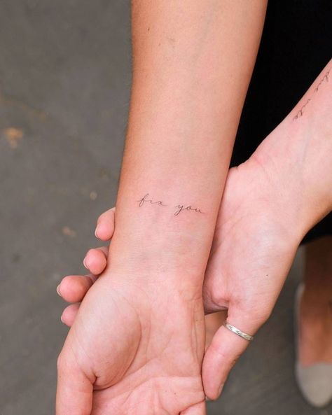 "Fix you" lettering tattoo handwritten on the wrist. Wrist Font Tattoo, Cursive Tattoo On Wrist, Writing On Wrist Tattoo, Cursive Numbers Tattoo, Wrist Writing Tattoo, Handwritten Tattoo Ideas, Name On Wrist Tattoo, Wrist Tattoo Writing, Tiny Hand Tattoos