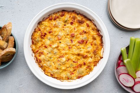 This easy artichoke dip is made with the addition of roasted red peppers (or pimentos if you prefer), which gives the dip a festive holiday look. Easy Artichoke Dip, Stuffed Cherry Tomatoes, The Spruce Eats, Artichoke Dip Easy, Roasted Red Pepper Dip, Red Pepper Dip, Red Pesto, Artichoke Dip Recipe, Stuffed Pepper Dip