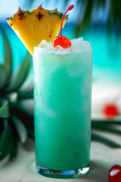 Blue Hawaiian Drink Recipe, Blue Hawaiian Drink, Cocktail With Rum, Curacao Drink, Coconut Rum Drinks, Hawaiian Drinks, Christmas Cocktails Easy, Cream Of Coconut, Tropical Drinks