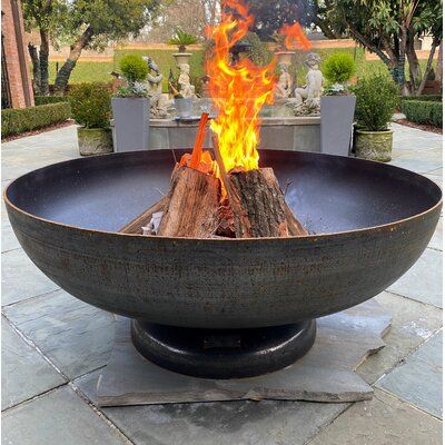 17 Stories The Vulcan Fire Pit is an understated focal point, that forms the ultimate conversation piece and sets the stage for hours of warmth. 17 Stories manufactures and utilizes industrial strength tank heads for the bowls used in their fire pits. Tank heads are the end caps on cylindrically-shaped pressure vessels. They generally comply with ASME standards because of the high pressures they must withstand for use with gas storage tanks and reactors. Size: 20" H x 48" W x 48" D | 17 Stories Magnetic Drill, Steel Fire Pit, Wood Burning Fire Pit, Burning Fire, Storage Tanks, Wood Burning Fires, Steel Wood, Fire Bowls, Wooden Decks