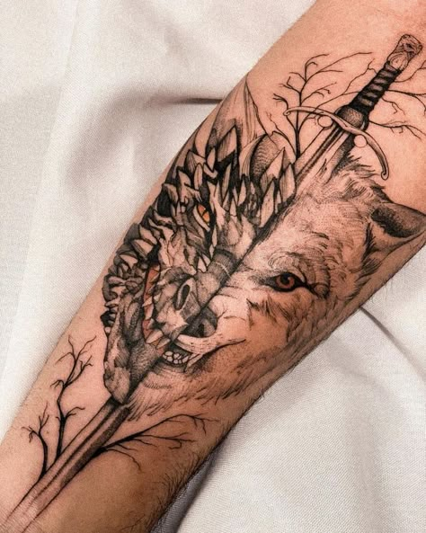 22 Powerful Game Of Thrones Tattoo Ideas For Hardcore Fans 7 Game Of Thrones Tattoos For Women, Finish Tattoo Ideas, Game Of Thrones Sleeve, House Of Dragon Tattoo Ideas, Protector Tattoo Ideas, Drogon Game Of Thrones Tattoos, Direwolf Tattoo, House Stark Tattoo, Got Tattoo Game Of Thrones