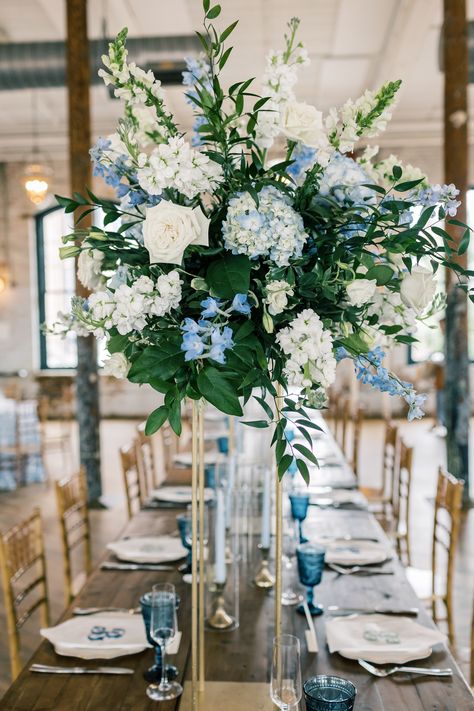 https://freshweddingsandevents.com/ Instagram: @FreshWeddings_CHS Hydrangea Arrangements Wedding, Blue Hydrangea Centerpieces, Blue Hydrangea Bouquet, Wedding Reception Tables Centerpieces, Blue Hydrangea Wedding, Blue White Weddings, Table Arrangements Wedding, Hydrangea Centerpiece, White Roses Wedding