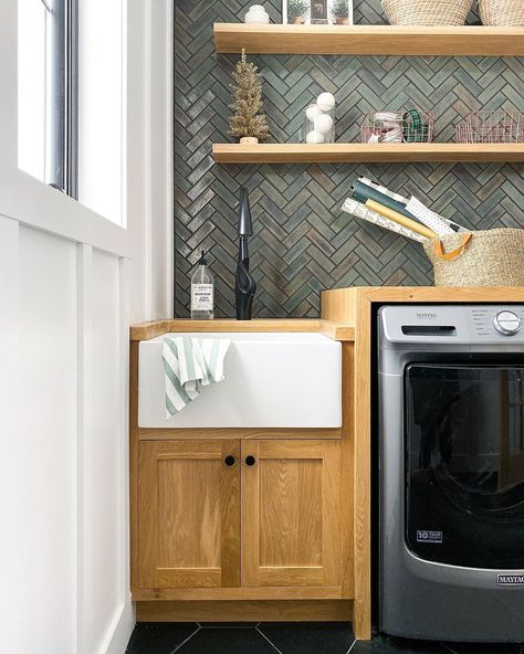 Joinery & Design Co. on Instagram: “It’s amazing how festive this room feels with that GREEN tile and of course my dryer balls turn into snowball decor(duh).🎄❄️😉 This time of…” Laundry Room Wallpaper, Laundry Room Closet, Laundry Room Sink, Farmhouse Apron, Joinery Design, Laundry Room Renovation, Farmhouse Aprons, Laundry Room Cabinets, Laundry Room Remodel