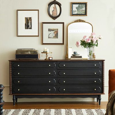 Embark on a journey of elegance and nostalgia with our French-style solid wood dresser. This eight-drawer cabinet is a testament to classic styling that never goes out of fashion. Boasting a sleek and retro design, it brings a touch of sophistication to any bedroom. Crafted from prized red oak wood, prized for its natural and straight grain, this dresser exudes a timeless elegance. The smoke black and walnut color combination creates a retro collision of textures, exuding a high-end feel even in Where To Place Dresser In Bedroom, Art Over Dresser Bedroom, Accent Dresser In Bedroom, Black Wood Dresser, Espresso Furniture Bedroom, Black Dresser With Wood Top, Black And Wood Furniture, Black Dresser Bedroom Ideas, Above Dresser Wall Decor