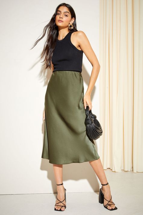 Olive Green Midi Skirt Outfit, Olive Turtleneck Outfit, Olive Green Satin Skirt Outfit, Olive Outfits For Women, Green Silk Skirt Outfit, Olive Skirt Outfit, Olive Green Skirt Outfit, Midi Satin Skirt Outfit, Green Satin Skirt Outfit