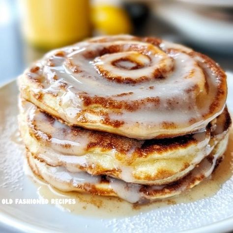 Ingredients: For Pancakes: 1 cup all-purpose flour 2 teaspoons baking powder 1/2 teaspoon salt... Cinnabon Pancakes, Cinnamon Roll Pancakes Easy, Cinnamon Bun Pancakes, Cinnamon Swirl Pancakes, Cinnamon Roll Pancakes Recipe, Pancake Syrup Recipe, Cinnamon Roll Pancakes, Cinnamon Pancakes, Pancake Syrup