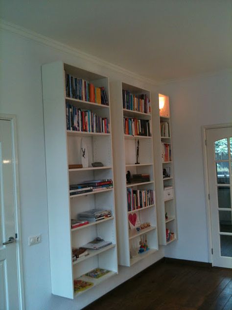 Ikea Billy bookcases mounted to the wall... I would love to do this with the glass doors for my dining room for china and glassware! Cheap Bookcase, Billy Hack, Ikea Lack Shelves, Billy Ikea, Diy Space Saving, Billy Bookcase Hack, Billy Regal, Ikea Billy Bookcase Hack, Ikea Bookcase