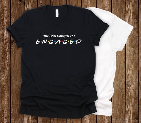 Newly engaged and a Friends fan?? You need this shirt to rock out during your engagement! Notice the fine detail in between, those are diamonds in between instead of circles too! TANK TOP AVAILABLE: https://www.etsy.com/listing/692037281/the-one-where-im-engaged-tank-top-bride?ref=listings_manager_grid  DETAILS & SIZING DETAILS: Shirts used are Bella Canvas brand. They are a very soft and high quality t-shirt. They have a more attractive fit than a regular gildan or fruit of a loom tshirt.  SIZI Finally Engaged, Engagement Shirt, Friends Fan, Cute Couple Shirts, Plus Wedding Dresses, Couples Shirts, Wedding Shirt, Friends Cake, Cute Engagement Photos