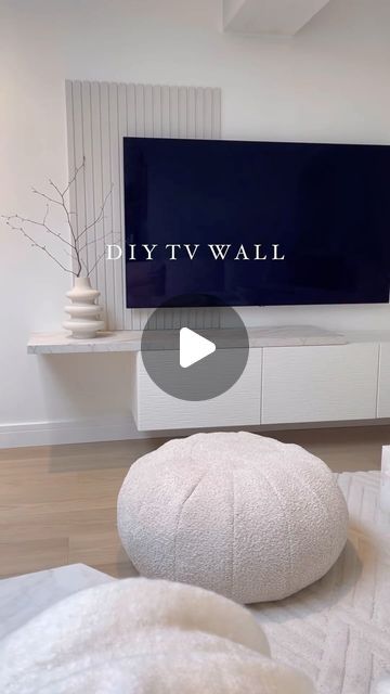 DIY - IKEA Hack on Instagram: "@cb_loves_interiors_20 shared this IKEA Besta hack creating a sleek, wall-mounted TV unit with style. By adding white Laxviken door fronts and a custom-cut laminate worktop shelf, she elevated the basic Besta into a chic media center.   The finishing touch is DIY paneling made from MDF strips. It’s a perfect blend of IKEA basics and creative customization for a high-end look.   For more ideas and inspiration, be sure to check out Cheryl’s page @cb_loves_interiors_20  . . #ikeahack #ikea #ikeahome #ikeaideas #ikealover #interiordesign #diy #HomeDecor #diyideas #diyproject #home #HomeDIY #InteriorDesign" Ikea Besta Tv Hack, Ikea Hacks Tv Wall Unit, Ikea Besta Tv Unit Hack, Ikea Tv Unit Ideas, Ikea Media Wall Hack, Besta Ikea Living Room, Besta Ikea Ideas Inspiration, Ikea Besta Living Room Ideas, Diy Tv Unit