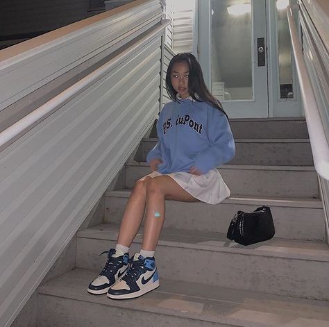 a light blue crew neck over a white collared shirt with a white pleated skirt and air jordan 1 obsidians Jordan Outfits Womens, Air Jordan Outfit, Tennis Skirt Outfits, Jordan 1 Outfit Women, Jordan Outfit, White Pleated Skirt, Cute Skirt Outfits, White Collared Shirt, Jordan Outfits