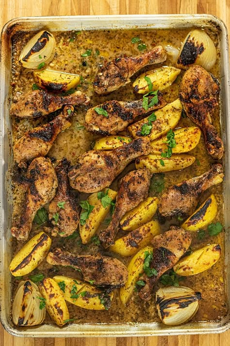 Greek Chicken Drumsticks & Potatoes Sheet Pan Dinner Sheet Pan Drumsticks And Potatoes, Drumstick Sheet Pan Dinner, Sheet Pan Drumsticks, Greek Chicken Drumsticks, Cabin Dinners, Potato Sheet Pan Dinner, Potato Sheet Pan, Easy Greek Chicken, Annabel Langbein