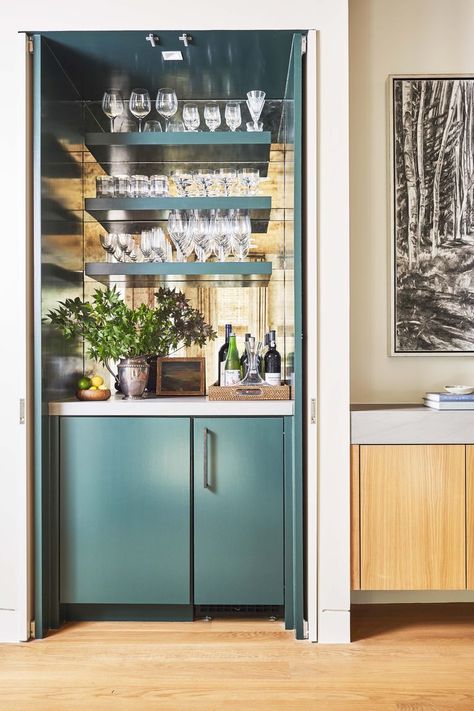 This teal colored home bar from House Beautiful is sure to stand out in any room. It is perfect for most any style decor. #homebar #homebardesign #drybarstyle #homebardecor Small Home Bar Ideas, Small Bars For Home, Home Bar Ideas, Closet Bar, Hidden Bar, Home Bar Design, Home Bar Designs, Bar Areas, Bar Ideas