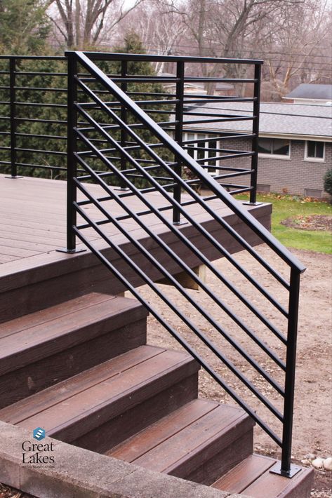 With horizontal metal railing, a traditional brick home gets a modern makeover with new deck and steel railing. Secure and beautiful design for any project. Metal Outdoor Railing Ideas, Ramp Railing Design Outdoor, Horizontal Metal Deck Railing, Metal Stair Railing Outdoor, Patio Railings Metal, Steel Railings Outdoor, Steel Horizontal Railing, Outdoor Horizontal Railing, Metal Railings Outdoor Modern