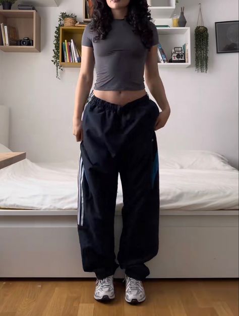 Baggy Windbreaker Pants Outfit, Track Pants Work Outfit, Y2k Track Pants Outfit, Black Nike Track Pants Outfit, Track Pants Gym Outfit, 90s Track Pants Outfit, Adidas Parachute Pants Outfit, Blue Nike Track Pants Outfit, Track Suit Pants Outfits