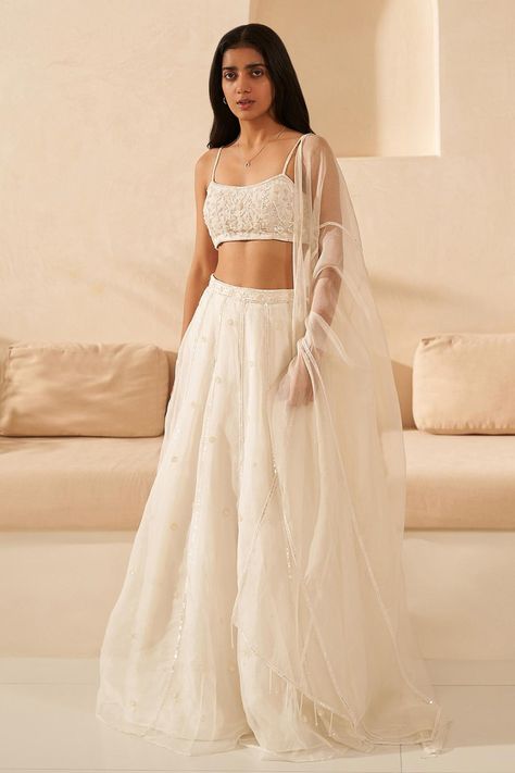 Off white embroidered lehenga set for women Light Lehenga Simple, Off White Lengha Design, White Lehenga Party Wear, White Pastel Lehenga, White Silk Lengha, Simple White Lengha, Full White Lehenga, Strap Blouses For Lehenga, White Indian Lengha