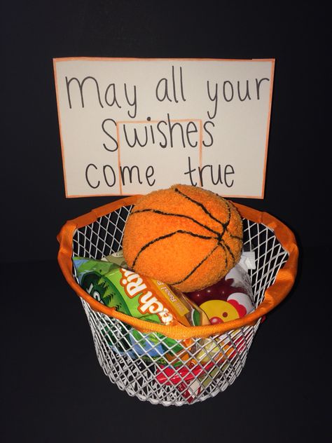 I made this gift basket for my boyfriends first basketball game of the season. The wire basket (hoop) is from dollar tree and I filled it with his favorite candy. I tried to make the sign look like the backboard but either way he was very happy with the gift! First Basketball Game, Basketball Boyfriend, Basketball Senior Night, Boyfriend Gift Basket, Senior Night Gifts, Basketball Party, Basketball Theme, Basketball Birthday, Senior Gifts