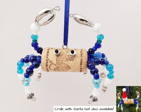 "Wine cork crab ornament is an ocean lover's best friend for so many occasions!  He would love to sit on your nautical themed tiered tray or coffee table, be a table ornament at a beach wedding, or hang out upon a beachy bathroom shelf.  He'd be a great friend keeping you company on your office desk and would impress your friends hanging in your home bar. He also loves being a beach house housewarming gift or a hostess thank you present.  The Santa hat version of wine cork crab will look so ador Cute Table Decorations, Beach Wedding Small, Fisherman Boat, Crab Ornament, Beachy Bathroom, Wine Cork Ornaments, Wine Cork Diy, Cute Table, Cork Ornaments