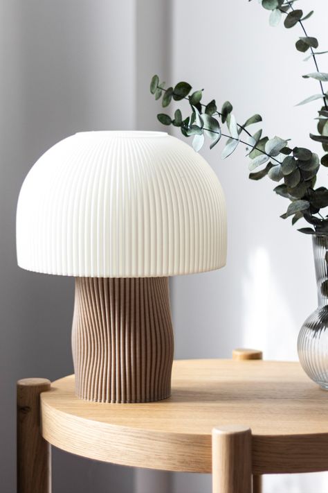 Introducing our Mushroom Lamp, a delightful addition to any room in your home! The unique table light is designed in the shape of a mushroom, with a base inspired by our exclusive Iris vase collection. This lamp is perfect for creating a cozy and inviting atmosphere in your living room, bedroom, or any other space where you want to add a touch of charm. 3d Lamp Design, Modern Lamp Design, Lightning Storms, Mushroom Light, Table Lamp Bedroom, Ancient Greek Mythology, Lamp Inspiration, Light Scattering, Mushroom Table Lamp