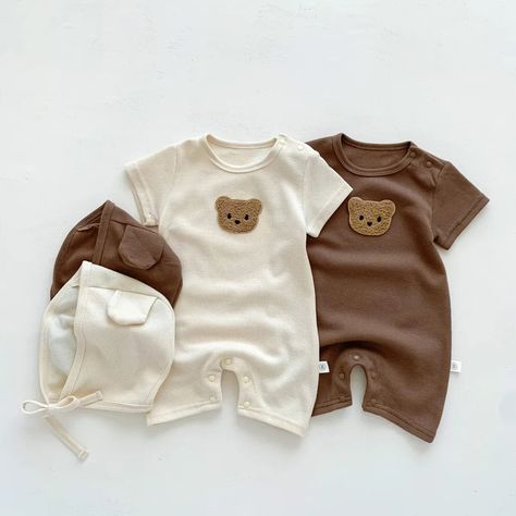 Introduce your little one to summer comfort and style with our Waffle Patch Bear Baby Romper. Designed for both baby girls and boys, this charming short-sleeved romper features a unique waffle texture, enhanced by an adorable bear patch that adds a touch of whimsy. Crafted from soft cotton, this infant jumpsuit is gentle on newborn skin, ensuring your baby stays comfortable during their summer adventures. The cute bear patch adds a playful element to the romper, making it an adorable outfit choice that's sure to gather compliments.Designed with short sleeves, this romper is ideal for keeping your baby cool and comfortable during the warm summer months.Each romper comes with a matching hat featuring cute ear details, providing extra cuteness and protection from the sun.The romper is designe Bonnet Hat, Jumpsuit Summer, Bear Ears, Ropa Diy, Cotton Romper, Baby Warmer, Bear Design, Baby Outfits, Baby Bear