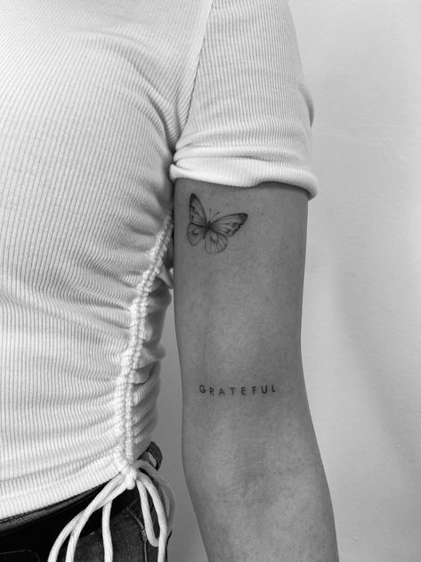 Tattoo Beautiful Word, Grateful Quotes Tattoo, Small Word Tattoos Arm, Back Arm Word Tattoo, Fine Line Tattoos On Arm, Tatoos Word Small, Words On Bicep Tattoo, Word And Butterfly Tattoo, Grateful Arm Tattoo