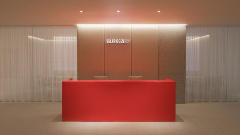 Nulty - Executive Offices, London - Striking Red Reception Desk Integrated Cove Lighting Backdrop Colourful Reception Desk, Reception Desk Backdrop, Red Office Interior, Red Office Design, Red Reception Desk, Receptionist Design, Japandi Office Design, Red Reception, Bureau Open Space