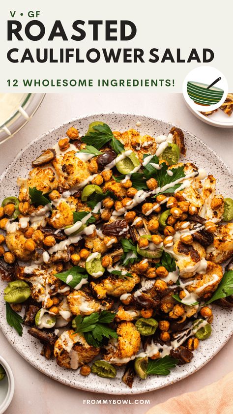 This Roasted Cauliflower Salad is influenced by the vibrant flavors of the Mediterranean. Oven-roasted cauliflower, spiced chickpeas, and sweet and tangy fruits combined into a warming side or appetizer. Vegan, Gluten-Free. Appetizer Vegan, Roasted Cauliflower Salad, Oven Roasted Cauliflower, Spiced Cauliflower, Spiced Chickpeas, Warm Salad, Crispy Chickpeas, Cauliflower Salad, Best Salad Recipes