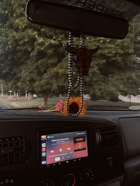 #tylerchilders #navajo #freshie #flowers #truck #driving #music #aesthetic #country #countrymusic #shakethefrost Country Car Aesthetic, Inside Truck Aesthetic, Country Truck Accessories, Western Truck Decor, Western Car Interior, Truck Decorations Interior, Truck Essentials, Truck Interior Accessories, Western Truck