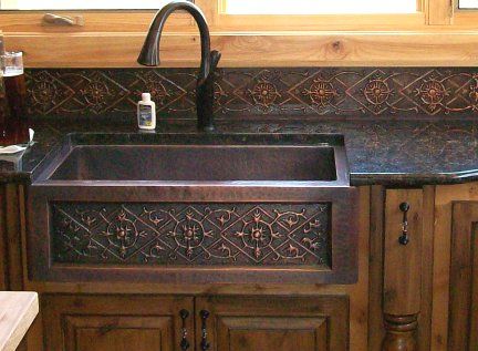 Ron never ceases to amaze me with his faux finishing work but this back splash he made to match the customer's copper sink is just unbelievable! How does he do it? He matched the sink so well I can't tell the difference, I would swear the back splash was copper too! Ranch Office, Copper Farm Sink, Rustic Industrial Kitchen, Stone Countertops Kitchen, Cabin Remodel, Property Ideas, Farmhouse Sinks, Copper Wood, Black Countertops