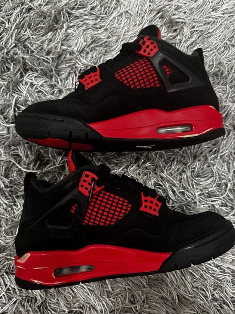 Elevate your sneaker game with these stylish Air Jordan 4 Retro Mid Red Thunder sneakers. Crafted with a mid-top shoe shaft style, these sneakers feature a striking black, multi-color, multi-color, and crimson colorway that is sure to turn heads. The style code, CT8527016, and release date, 20220116, add to the exclusivity of these sneakers. These sneakers are perfect for any athletic occasion and are designed with comfort in mind, making them an ideal choice for any active man. With a US shoe size of 4.5, these sneakers are a great fit for those with smaller feet. Don't miss out on the chance to own these stunning Air Jordan 4 Retro Mid Red Thunder sneakers. Jordan Air Red, Red And Black 4s, Red Thunders, Aesthetic Nike, Jordan 4 Red, Air Jordan Retro 4, Birthday Fit, Jordan 4 Black, Jordan 4’s