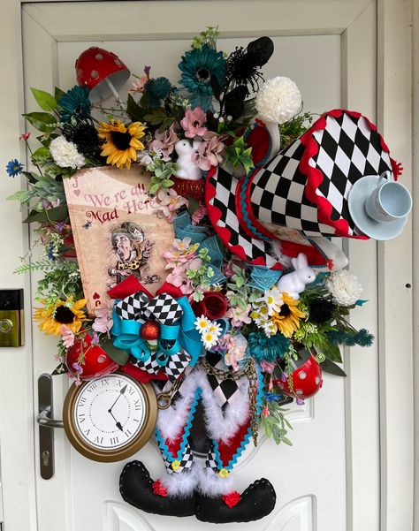 Huge unique unusual Alice in wonderland themed door wreath/swag. Can come in any colour to suit your requirements. Alice In Wonderland Accessories, Huge Door, Alice In Wonderland Hat, Wreath Swag, Alice In Wonderland Tea Party Birthday, Alice In Wonderland Tea Party, Mad Hatter Tea, Mad Hatter Tea Party, Tea Party Birthday