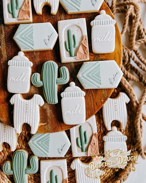 Megan Kelley on Instagram: "A western inspired baby shower Rectangle cactus design inspired by @hanamade.cookies #babyshowercookies #westerncookies #cookiesoginstagram #cookiesofidaho #idahocookier #cookiesofcda #decoratedcookie #batteranddough" Babychella Baby Shower Ideas, Western Chic Baby Shower Ideas, Vintage Western Baby Shower Ideas, Southwest Baby Shower Ideas, Aztec Baby Shower Ideas, Howdy Baby Shower Theme, Cactus Baby Shower Cookies, Cactus Theme Baby Shower Ideas, Desert Theme Baby Shower Ideas