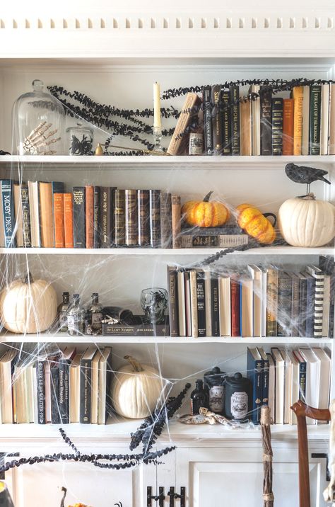 Halloween Book Shelf Decor, Bookshelf Halloween Decor, Halloween Built Ins Decor, Halloween Bookcase Decor, Halloween Shelves Decor, Fall Decor Bookshelf, Halloween Shelf Decor Ideas, Halloween Bookcase, Shelf Halloween Decor