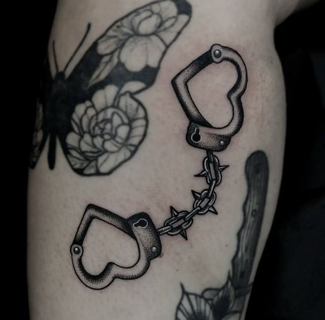 Heart Handcuffs Tattoo, Grunge Goth Tattoos, Heart Shaped Handcuff Tattoo, Back Tattoo Women Goth, Heart With Knives Tattoo, Simple Coffin Tattoo Ideas, Car Dice Tattoo, Heart Link Tattoo, Heart Handcuff Tattoo