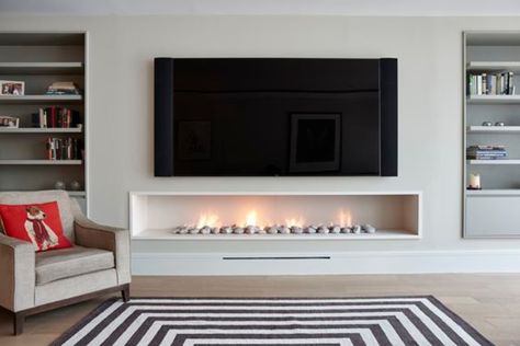 Hole in the wall gas fireplace, contemporary, modern style. modern living room by the platonic fireplace company modern limestone | homify Tv Mounted, Feature Wall Living Room, Linear Fireplace, Fireplace Tv Wall, Farmhouse Fireplace, Living Room Decor Fireplace, Contemporary Fireplace, Tv Wall Design, Modern Houses Interior