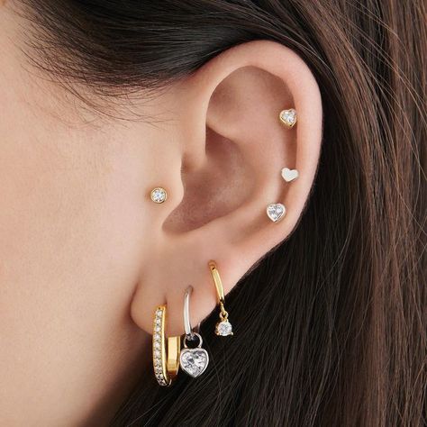 Studs on Instagram: "This Valentine's season, there are no mixed feelings, just mixed metals 🥰 Stack your Earscape® with alternating gold and silver styles for a fun twist ✨" Silver Gold Earring Stack, Mixed Metal Jewelry Earrings, Silver And Gold Piercings, Mixed Gold And Silver Ear Piercings, Gold And Silver Jewelry Together Ear, Mix Gold And Silver Earrings, Mixed Metal Earscapes, Silver And Gold Earrings Mixing, Gold And Silver Earring Stack