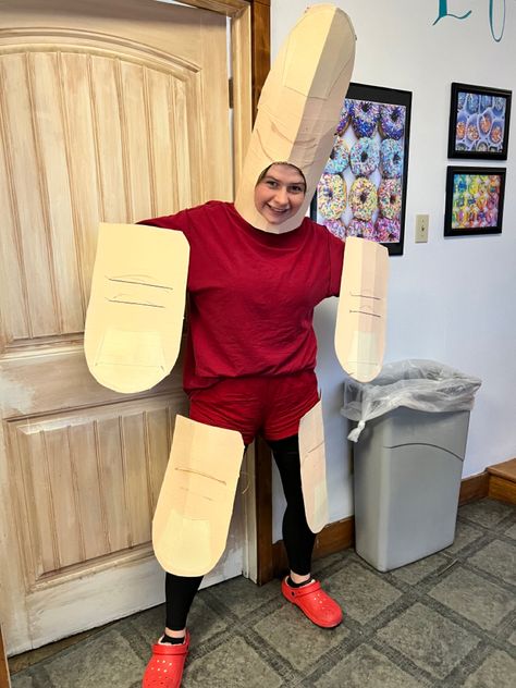 A person wearing a costume of a thumb thumb (creature from spy kids movie who is made of thumbs wearing a red jumpsuit) Thumb Thumb Costume, Spy Kids Thumb, Spy Kids Costume, Thumb Costume, Spy Kids Movie, Kids Movie, Spy Kids, Trendy Halloween Costumes, Trendy Halloween