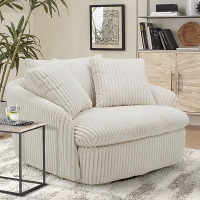 Dreamy comfort awaits with the Brieona oversized swivel chair. Comfy and cozy, its generous proportions are ideal for snuggling and nestling deep for relaxation. Its rounded silhouette has low arms and is complemented by a back pillow and two comfort pillows. Brieona has a 360-degree swivel base so you can face any direction and is available in luxuriously textured fabric options. | Accent Chair - Wade Logan® Brieona 47.5" Wide Polyester / Fabric in Black / White | 28 H x 47.5 W x 43.5 D in | Wa Large Swivel Chair, Oversized Swivel Chair, Cuddler Chair, Round Swivel Chair, Chair Comfy, Upholstered Swivel Chairs, Cozy Chair, Chair And A Half, Home Office Chairs