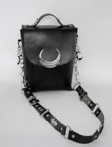 NOIR LUNA mini bag - satchel & shoulder/crossbody purse by Madelephant. - genuine tight black leather - magnet clasp under the flap - detachable & adjustable crossbody/shoulder strap with chain details - top handle - decorated with two stainless steel moon keychains on each side - two pockets (inside and on the back) - big moon detail in the front and moon details with d-rings on the handle. Size: 22 x 17 x 8 cm (8.6 x 6.7 x 3.2 in) You can use NOIR LUNA mini bag as a clutch or as a shoulder/crossbody bag. Moon Purse, Leather Magnet, Moon Shoulder Bag, Luna Bag, Gothic Bag, Big Moon, Gothic Accessories, Black Purses, Cute Bags