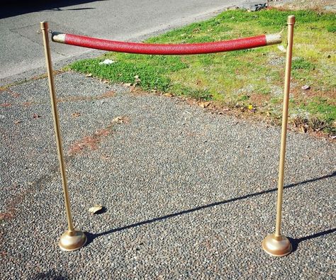 Lights! Camera! Action! A great way to decorate a red carpet themed party is to guide guests with fancy stanchions. If you search for stanchions online you can find that they are very expensive and they are very hard to find at a party store. So why not make your own?! You can make 3 stanchions with 2 ropes for about $9.50 without paint. It is very easy, if you have the right tools (drill and type of saw). Let's get started!You can follow me on Instagram @thisnameisnowchosen . :) Red Carpet Prom Theme, Diy Red Carpet, Red Carpet Ropes, Covered Pool, Red Carpet Theme Party, Cheap Backdrop, Red Carpet Theme, Red Paint Colors, Hollywood Party Theme