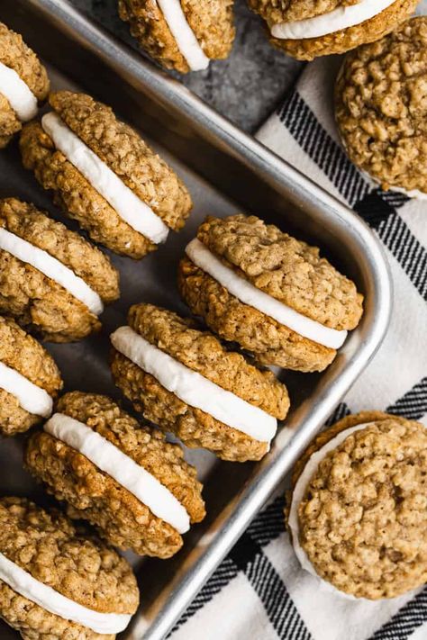 Make the best Oatmeal Cream Pie Cookies at home with this easy recipe! These chewy, homemade treats are perfect for a sweet snack. A simple copycat version with no molasses that tastes just like the classic. Enjoy a delicious and nostalgic dessert with these oatmeal cookies. Flat Oatmeal Cookies, Ultimate Oatmeal Cookies, Discard Oatmeal Cream Pies, Gingerbread Oatmeal Creme Pie, Buttery Oatmeal Cookies, Oatmeal Crème Pies, Home Made Oatmeal Cream Pie, Gooey Oatmeal Cookies, Joanna Gaines Oatmeal Cream Pies