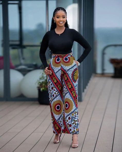 Ankara Styles 2022: Beautiful Trouser Outfit for Ladies. - Ladeey Trouser And Top For Ladies, Outfit For Ladies, Ankara Pants, Ankara Trousers, Ankara Styles For Women, Fashion Trousers, Short African Dresses, Bell Pants, African Dresses Modern