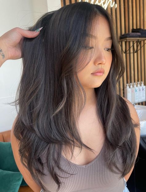 Brunette with Natural-Looking Ash Brown Highlights Asian Hair Highlights Straight, Ash Brown Babylights, Brown Babylights, Brown Hair Color Styles, Popular Hair Trends, Asian Brown Hair, Ash Brown Hair Dye, Medium Ash Brown Hair, Asian Hair Highlights