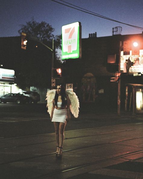 #toronto #filmphotography #filmisnotdead #angel #fallenangel #wings #girl #aesthetic #highheels #allwhiteclothes #homemade #cosplay #halloween #halloweenmakeup #halloweencostumeswomen #angelcore #lanadelreyaesthetic #longnails #styling #photoshoot #earthamk #artist #street #streetphotography #night #citystreet #lighting #nightphotography #dark #darkart #darkacademia #darkacademiaaesthetic #animeaesthetic #gothgirl #seveneleven #ossington #moodboard Homemade Cosplay, Angel Photoshoot, Angel Wings Photography, Styling Photoshoot, Angel Aesthetic, Fall From Grace, Halloween Photoshoot, Model Drawing, Cosplay Halloween