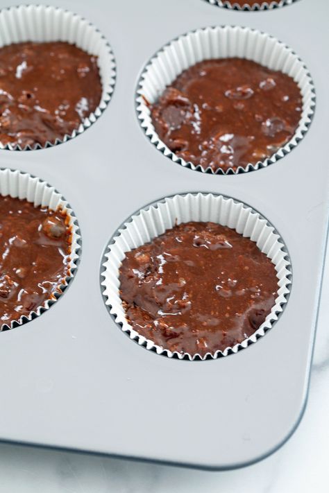 Brownie Mix Cupcakes -- If you're looking for the most rich and chocolatey cupcake recipe that also happens to be the easiest cupcake recipe, you need to try these Brownie Mix Cupcakes! With just 4 ingredients, these little cakes are a breeze to bake and perfect for all kinds of occasions. Cupcakes With Pudding Mix Chocolate, Brownie In Muffin Cups, Brownies Cupcakes Recipes, Brownies In A Cupcake Pan, Brownie Mix Cupcakes Recipes, Brownie Cookie Cupcakes, Brownie Mix Muffins, Brownies In Muffin Pans, Muffin Pan Brownies