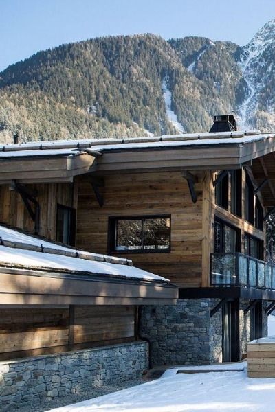 Chalet Elevation is surrounded by the majestic mountains of the Chamonix Valley, where you can enjoy recharging your batteries in the outdoor hot tub. 

Discover more via the link. 

#chamonix #chamonixmontblanc #luxurytravel #luxurychalets #luxuryski #skiholiday #skiing #luxuryholiday #luxurylifestyle Rustic Chalet Exterior, Modern Swiss Chalet Exterior, Chalet Exterior Design, Small Chalet Design, Modern Chalet Exterior, Swiss Chalet House Exterior, Chalet Design Exterior, Swiss Chalet Exterior, Modern Chalet Architecture