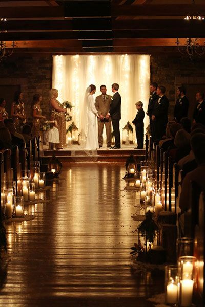 Winter Wedding Chapel Decorations, Romantic Chapel Wedding, Candle Lit Ceremony Aisle, Wedding Indoor Lighting, Candle Decor Wedding Ceremony, Indoor Winter Wedding Ceremony, Candle Light Wedding Ceremony, Indoor Wedding Ceremony Backdrop, Candle Lit Wedding Ceremony